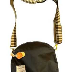 Riveter Hopper 
Black Crossbody Bag with Striped Strap